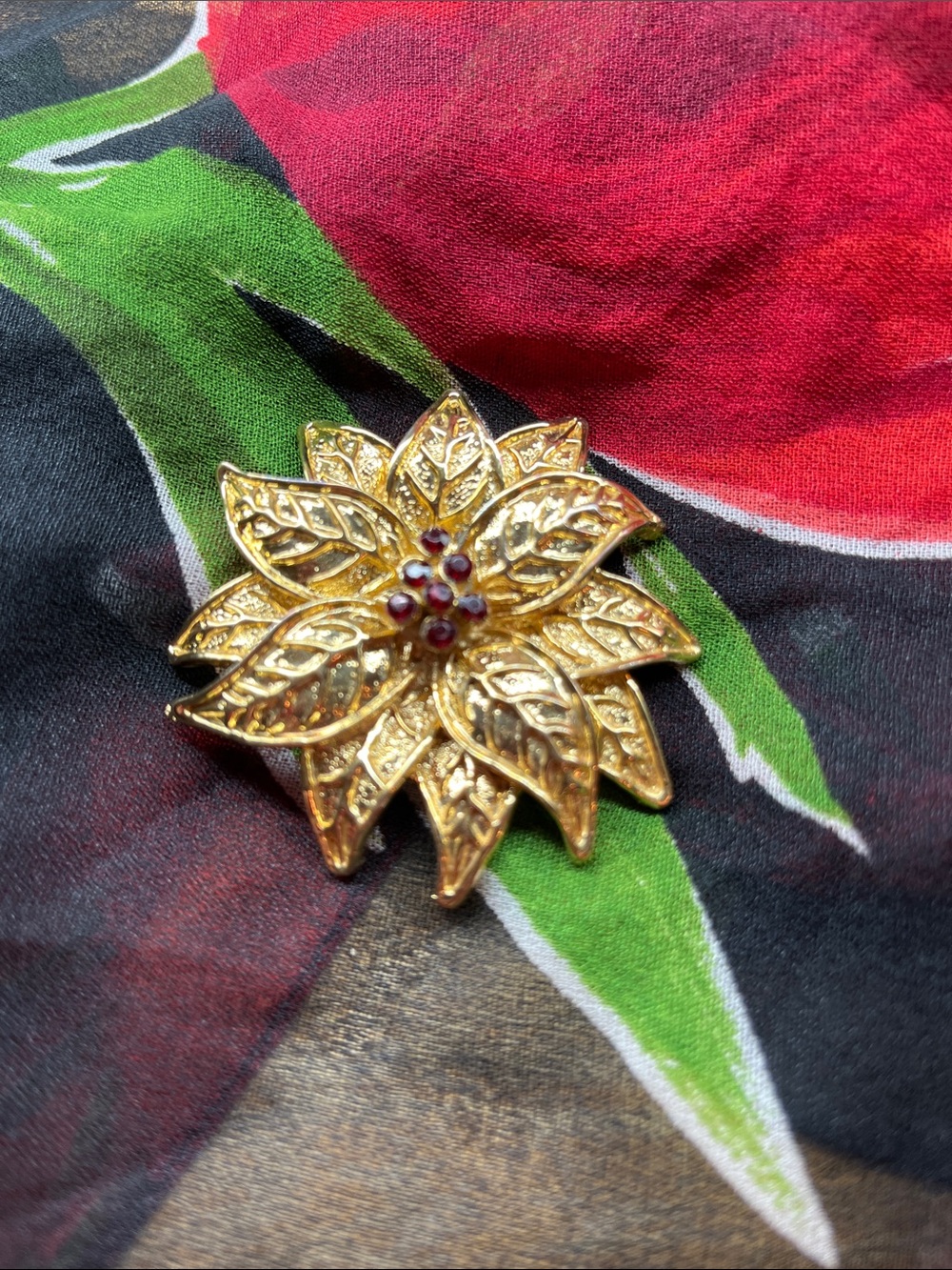 Poinsettia gold tone scarf clip